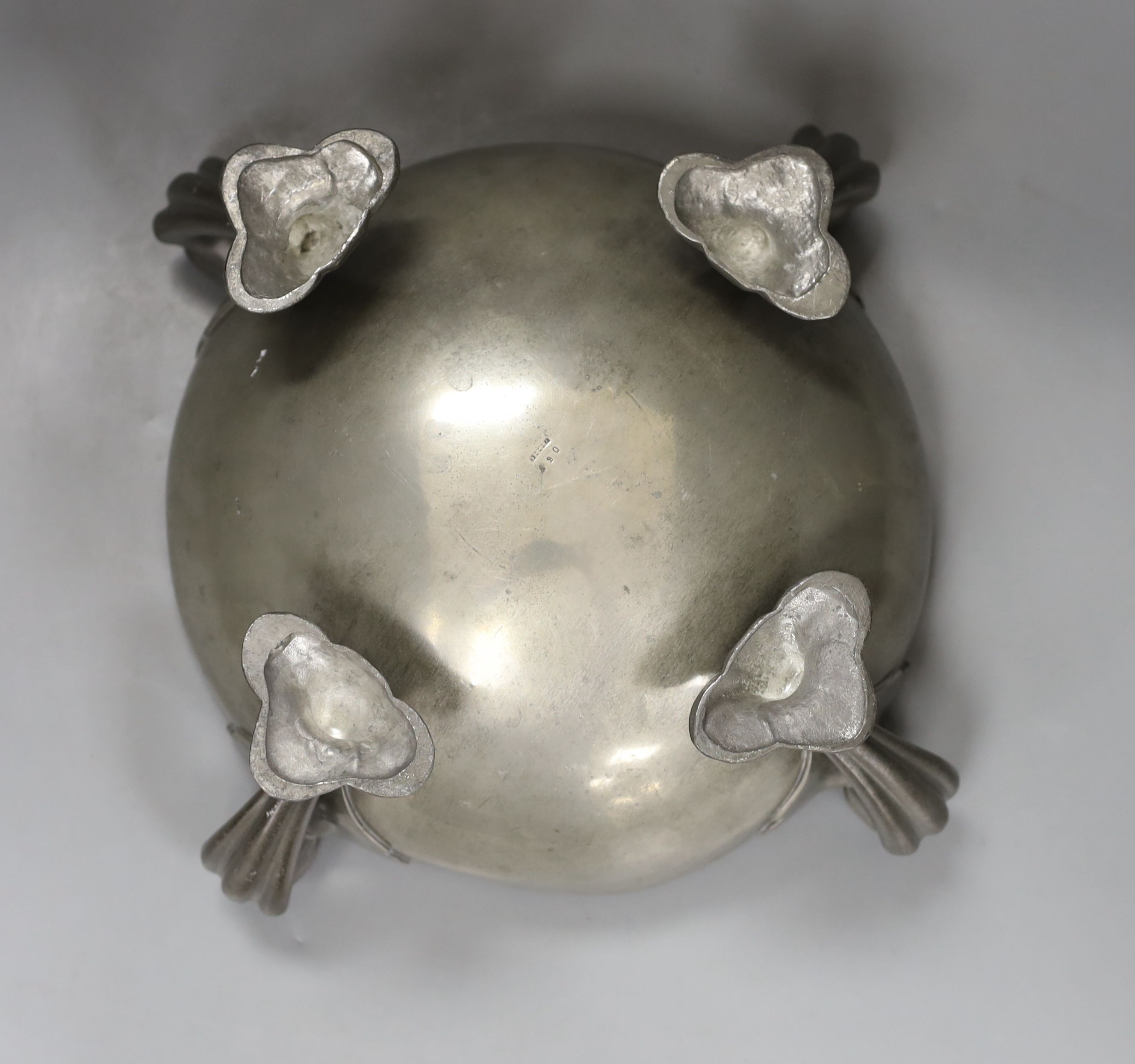 Oliver Baker for Liberty’s, a Tudric pewter fruit bowl, shape 067, on stylised feet, 26cm. diam.